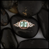 This Mint Garnet is set in a 14K Yellow and Rose Gold frame