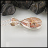 Crazy Lace Agate Paisley and Flower Pendant