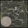 Dainty Celtic heart necklace in Sterling Silver measures 1/2" by 7/16"