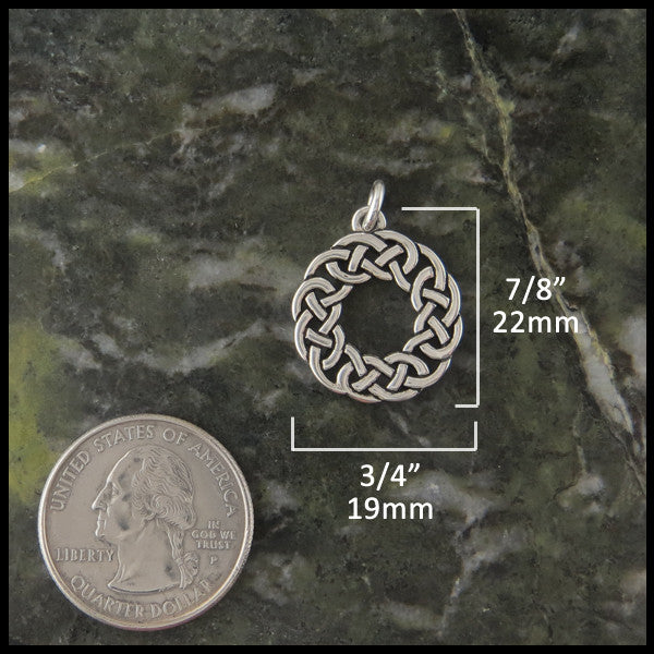 Lover's Knot Celtic pendant in Sterling Silver measures 7/8" by 3/4"