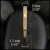 Side view of 14k yellow gold milgrain stacking ring with diamonds.  2 millimeters wide at the top tapers to 1 1/2 millimeters wide at the bottom