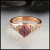 Rose and White gold ring with Malaya Garnet