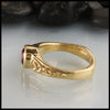 Profile view of Custom Rhodolite Garnet Ring in yellow gold