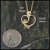 Celtic spiral heart pendant measures 3/4" by 15/16"