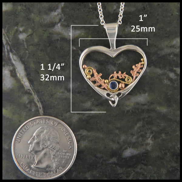 Pendant measures 1 1/4" by 1"