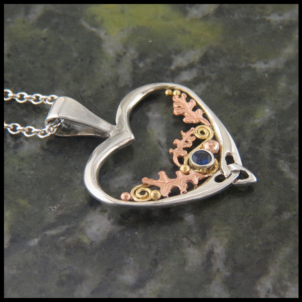 Sterling Silver and Gold Celtic pendant set with Gemstones