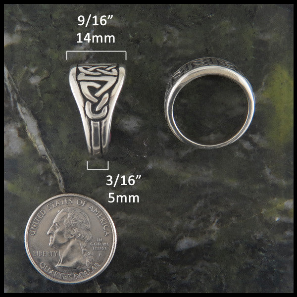 Ring measures 9/16" on face to 3/16" at base of band