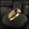 Garnet Spiral Knot Celtic Ring with Gemstones in 14K Gold