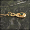 Tsavorite pendant in 14K gold