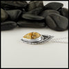 profile view of mookaite pendant