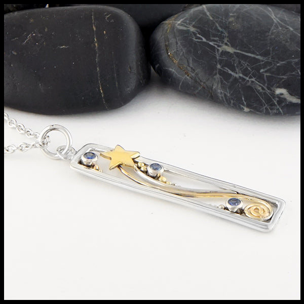 Profile view of Ceylon Sapphire Shooting Star Pendant