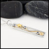 Profile view of Ceylon Sapphire Shooting Star Pendant