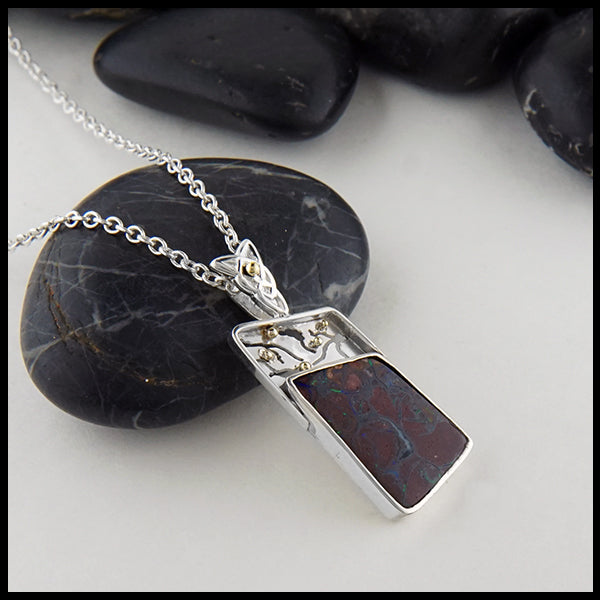Profile view Boulder Opal Pendant on 18" cable chain