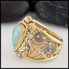 Profile view of Ethiopian Opal Ring in yellow, rose, and white gold