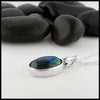 Profile view of azurite pendant