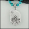 Rear view of pendant engraved design 