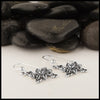 Profile View of Trinity Know Snowflake Earrings